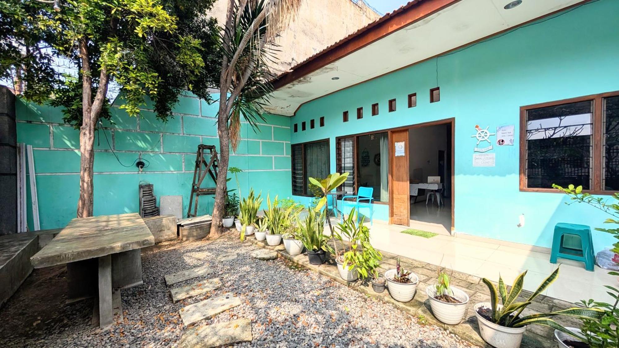 Homey Guesthouse Kertajaya 泗水 外观 照片